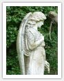 carved angel on a grave headstone