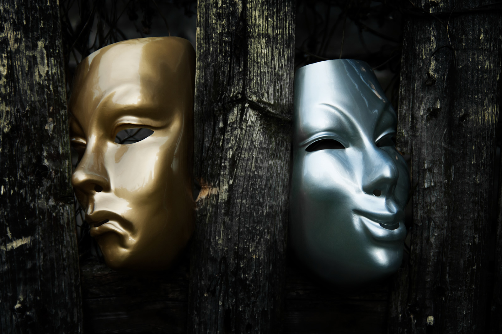 drama masks in gold and silver